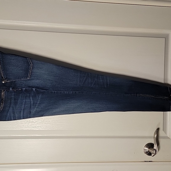 Jeans with faux leather ate front and back pockets. - Picture 3 of 7